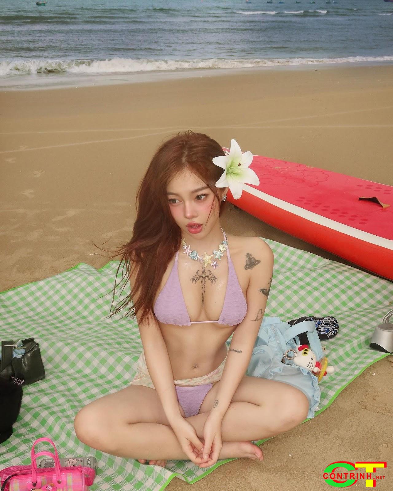 anh-hai-an-mac-bikini-sexy-khoe-hang-tren-bai-bien