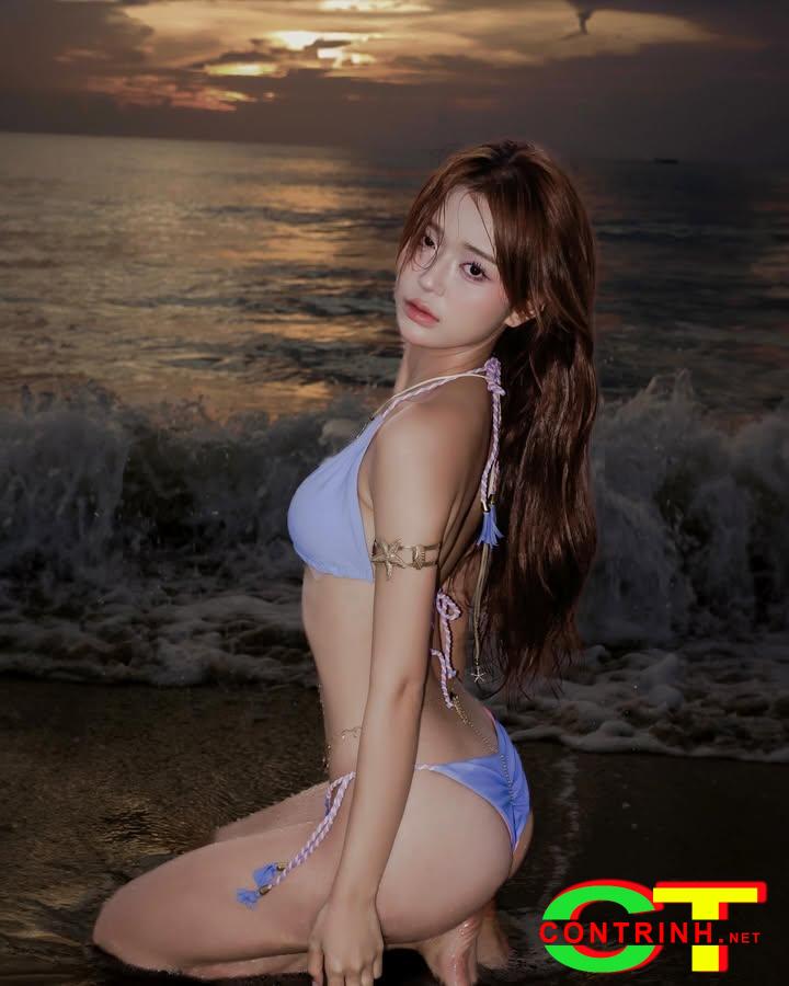 anh-mai-ha-hoang-yen-mac-bikini-tao-dang-sexy-chup-hinh